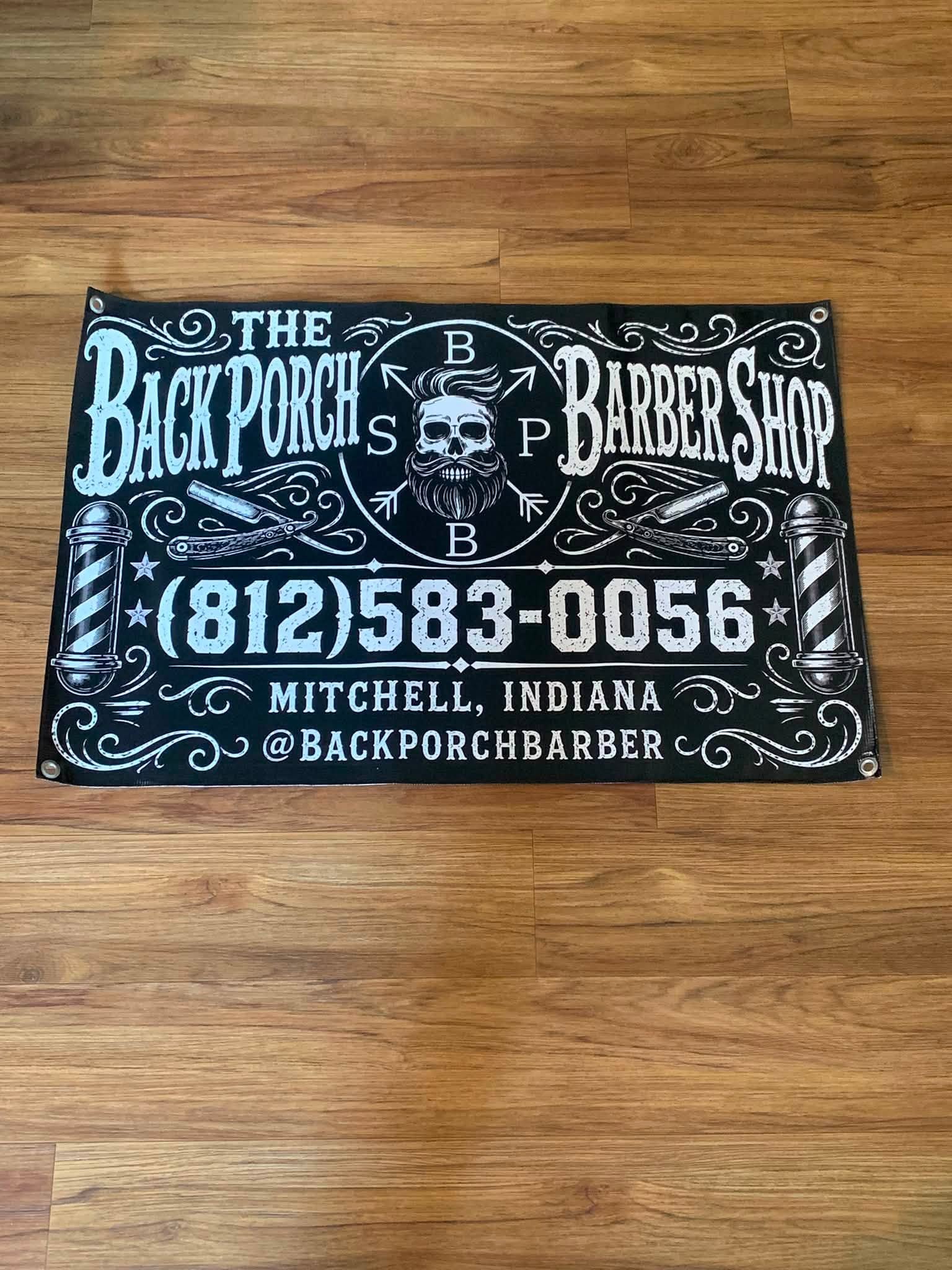 The Back Porch Barber Shop custom piece with hand-lettered styling, straight razors, and barber poles